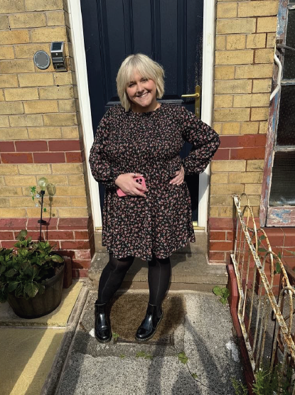 Photo of Jess Meller standing in front of her home in Edgeley